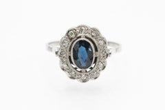Bague grappe ancienne en platine avec saphir et diamants, début du XXe siècle