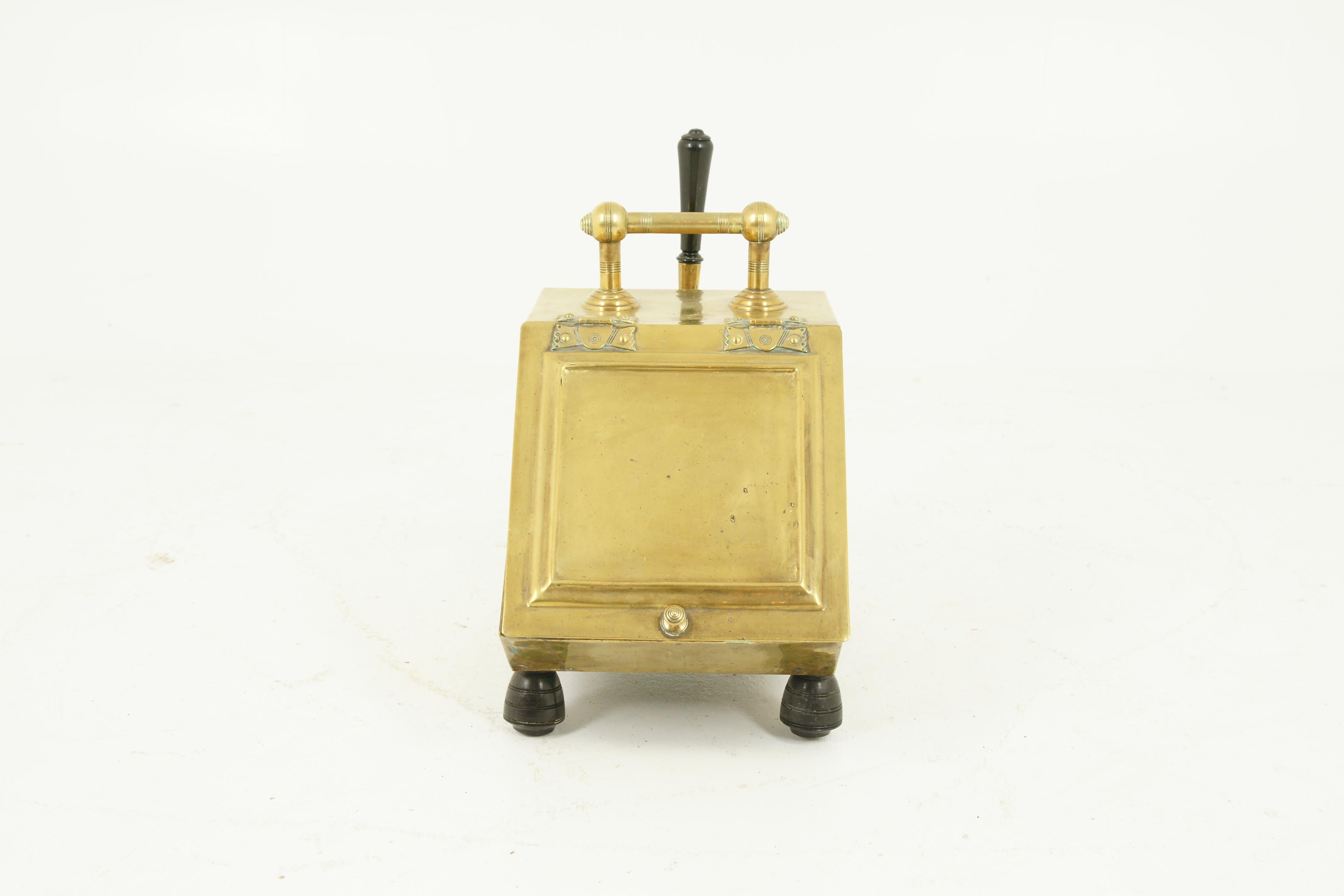 Antique coal hod, coal box, brass coal box, Scotland 1880, H048

Solid brass in original condition
Brass handle on top
Shovel sitting at the back
Slanted lift up front
Original metal lift out coal liner
Ending on four ebonized turned