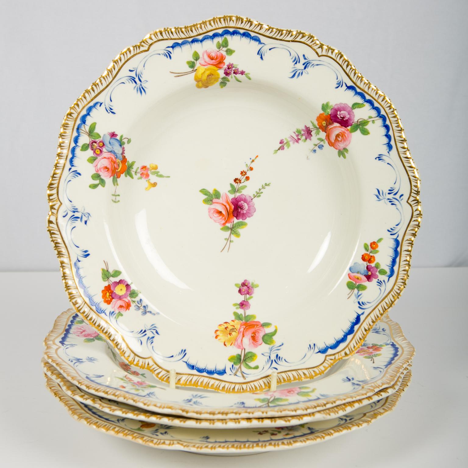 We are pleased to offer this set of four antique soup dishes made by Coalport n England, circa 1820. We also have a set of four matching large dinner dishes in the same pattern. See 1st Dibs Ref. # Ref: LU866511782291. The style of these soup dishes