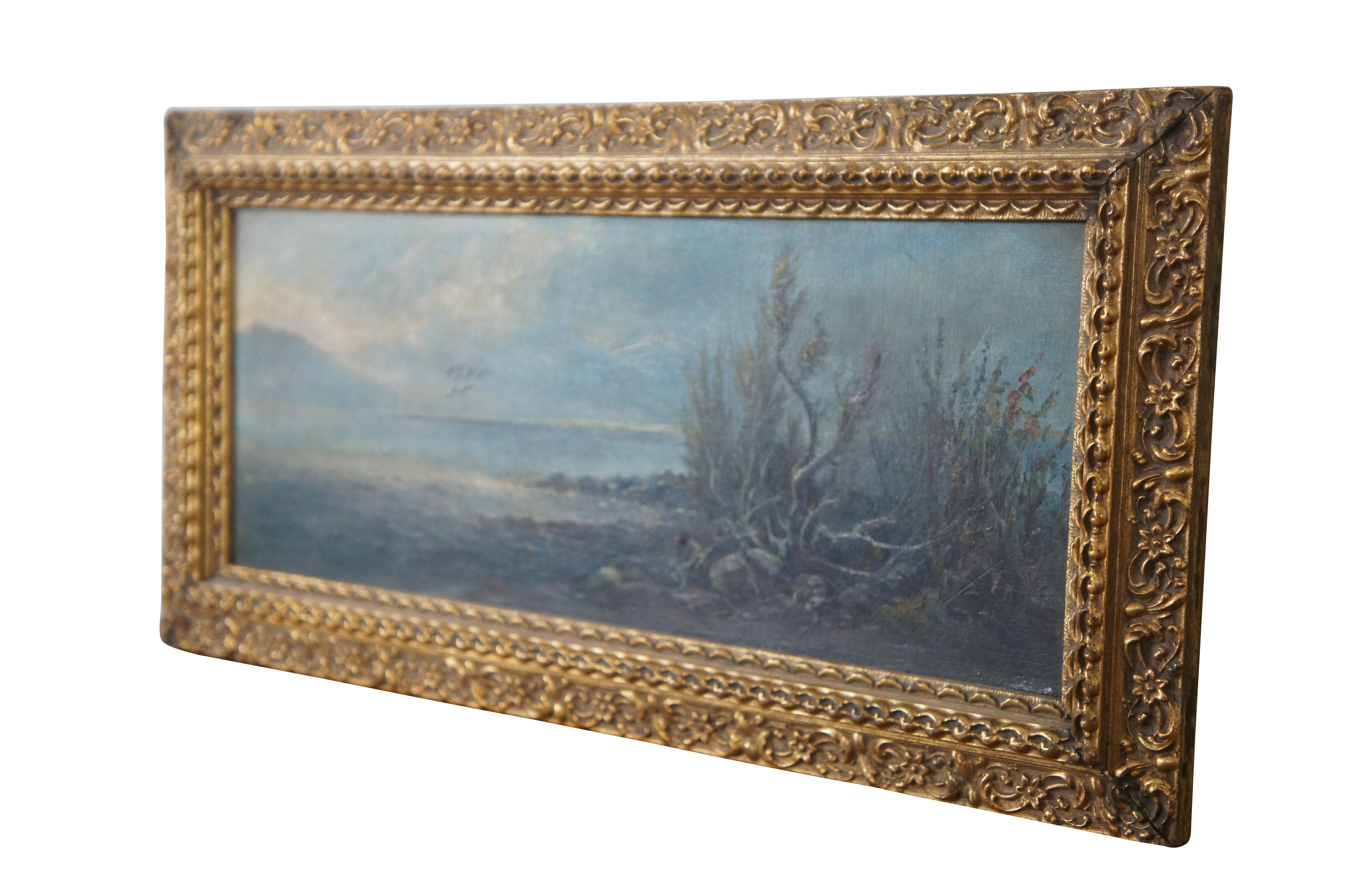 Antique coastal landscape / seascape oil painting on board featuring a group of birds flying over calm water with mountains lining the horizon.  Framed in ornate baroque gold with floral motif.  Signed lower left.

Dimensions:
18.5