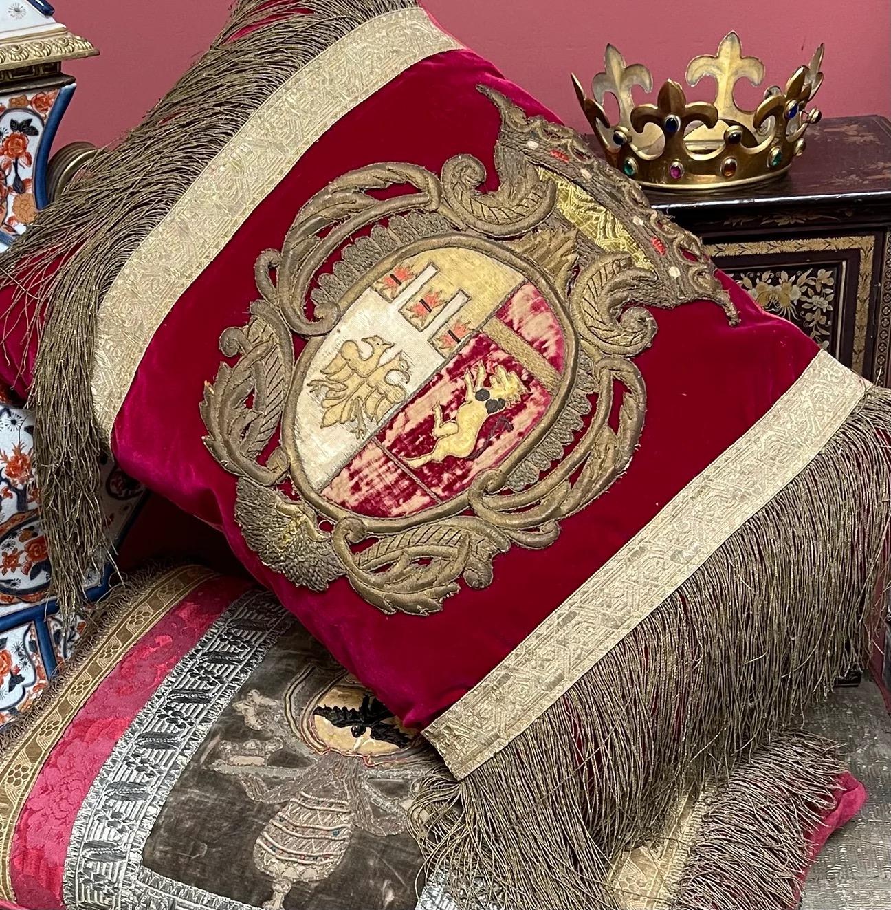 Exquisite Antique Pillow

A very impressive Baroque Coat of Arms Depicting Family Crest

Spanish or Italian.

Late 17th early 18th century

Upon very fine quality Magenta antique Silk Velvet

Finished with 17th Century Florentine Metallic gold