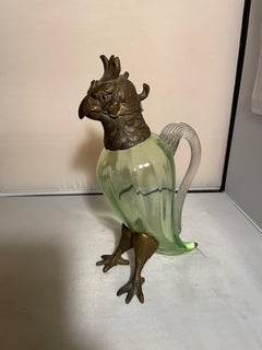 Antique "Cockatoo" Claret Jug, gilded Bronze , moulded glass. England 1900s.