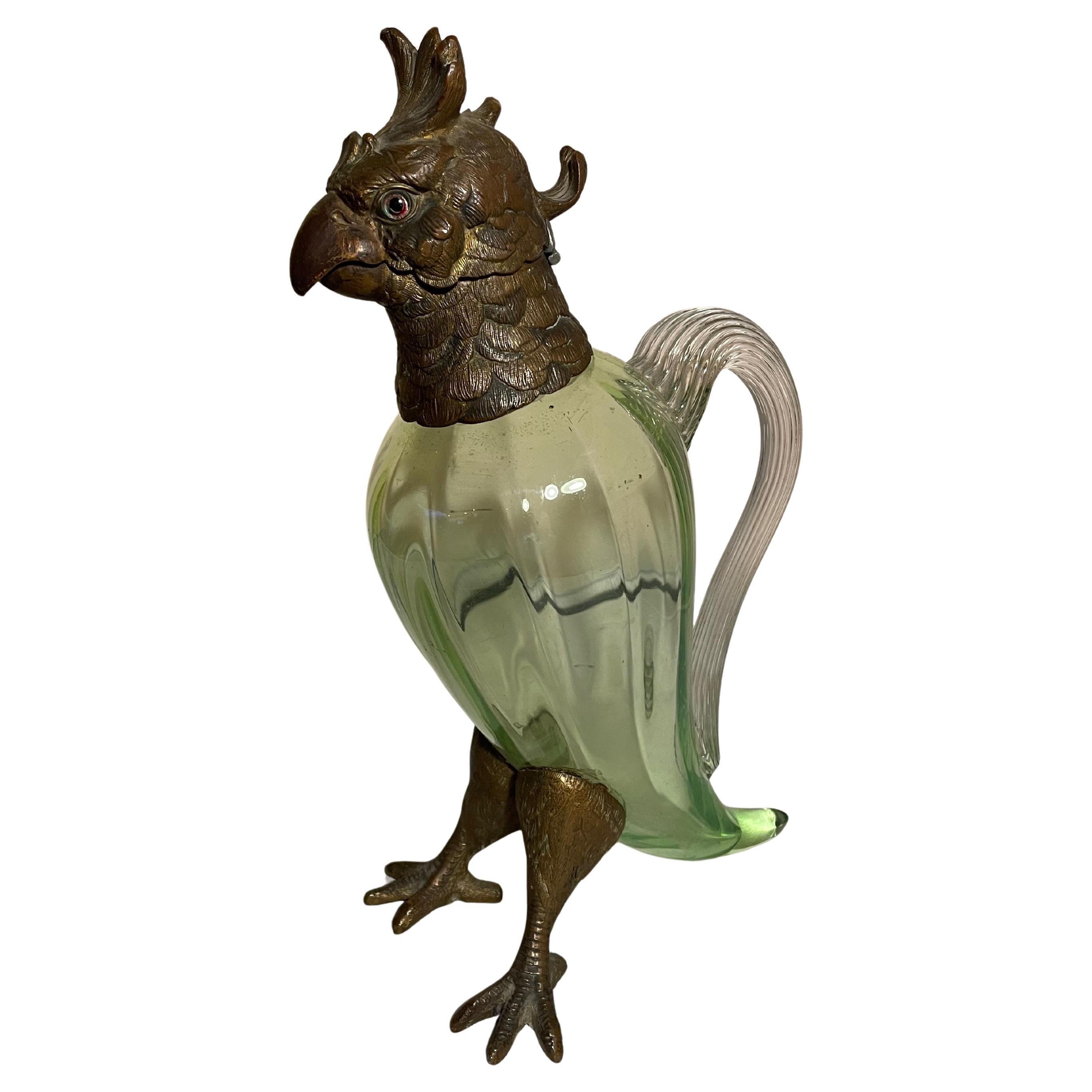 Antique "Cockatoo" Claret Jug, gilded Bronze , moulded glass. England 1900s.