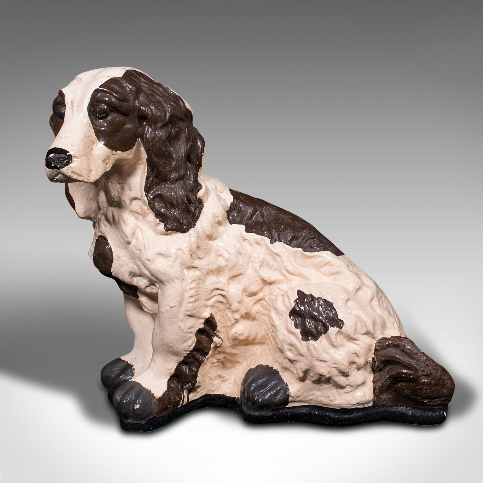 This is an antique cocker spaniel statue. An English, plasterwork dog figure, dating to the late Victorian period, circa 1900.

Fine decorative specimen of the popular breed
Displays a desirable aged patina and in good original order
Quality