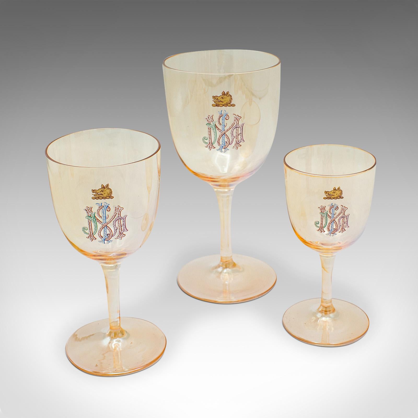 
This is an antique cocktail glass service. An Austrian, 12 piece wine, dessert and aperitif glass set, dating to the late Victorian period, circa 1900.

Appealing Marigold lustre set, ideal for a cocktail party
Displaying a desirable aged patina