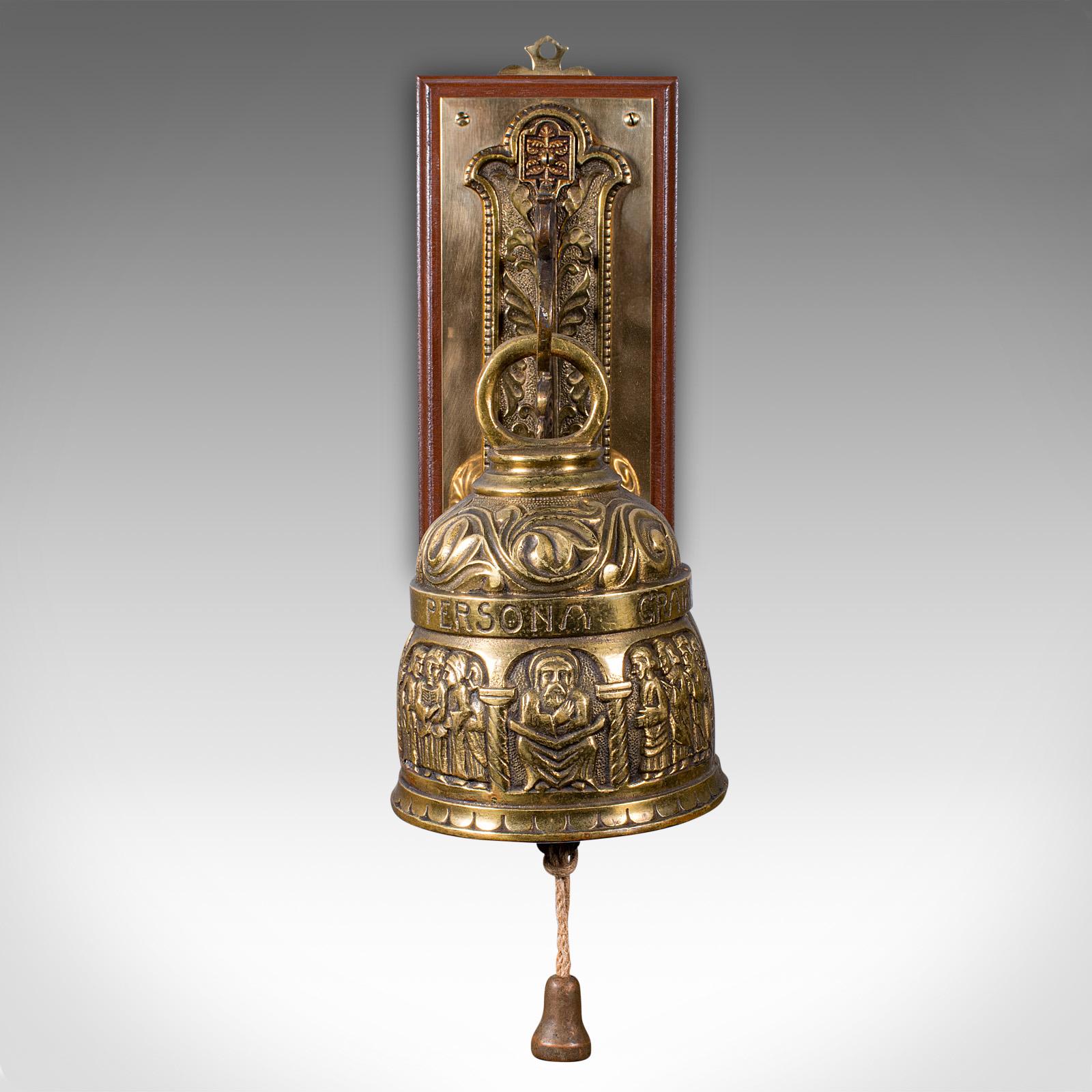 
This is an antique coffee house bell. An Italian, brass and mahogany wall mounted cafe bell, dating to the Edwardian period, circa 1910.

Charmingly decorative example, with an ornate mount
Displays a desirable aged patina and in good order
Brass
