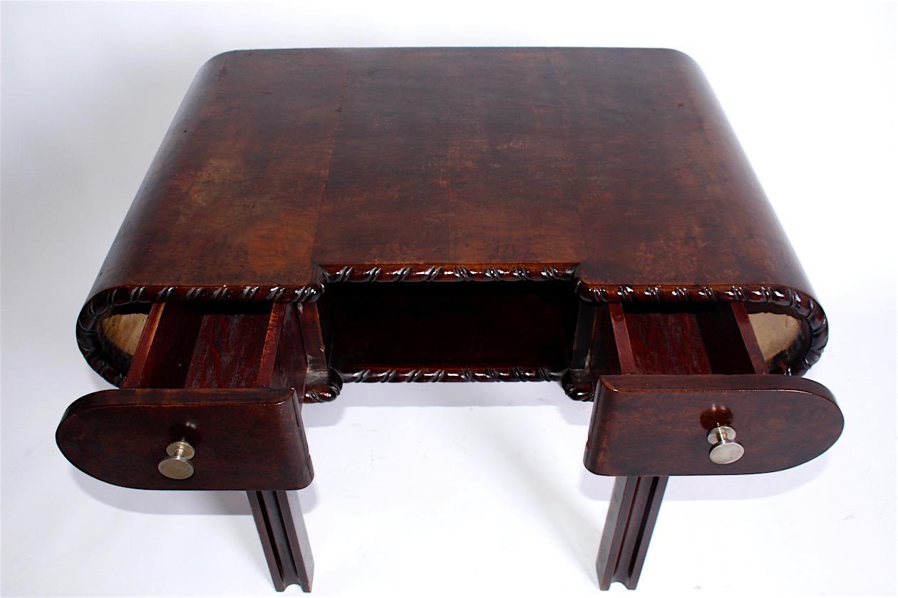 The table from the beginning of the 20th century is in its original condition, fine scratches on the board can be seen in the photos. Beautifully carved edges of the table. The table has two drawers.
