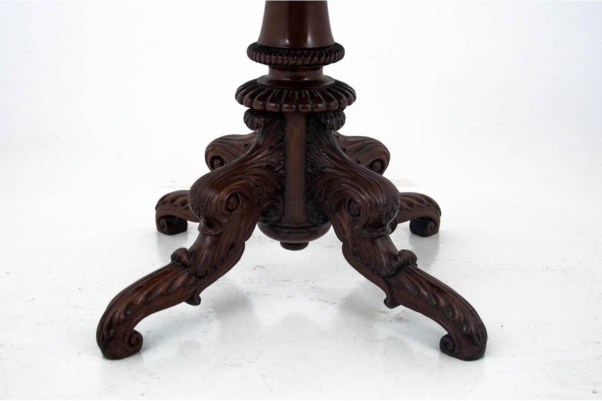 Coffee table, Northern Europe, circa 1930.

Currently under renovation.

Wood: mahogany

Dimensions: height 75 cm, diameter 94 cm.