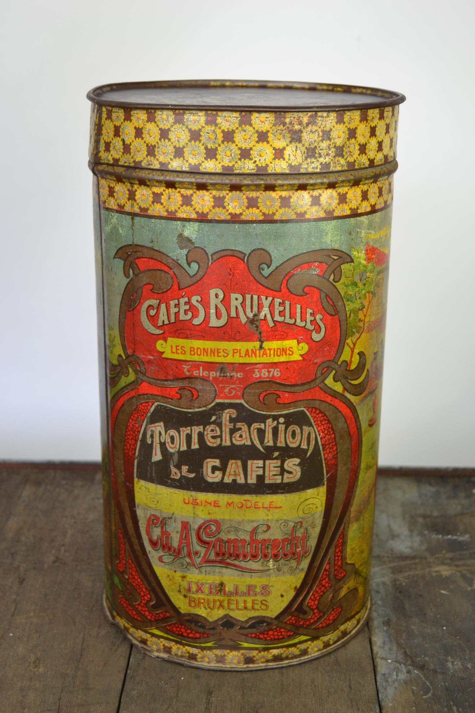 Antique Coffee Tin. 
A large tube shaped metal coffee box from Brussels Belgium. 
This coffee container dates from the Art Nouveau - Jugendstill Period, 1890-1900, 
and was made for the Coffee Company Ch. A. Lambrecht - Brussels - Bruxelles -