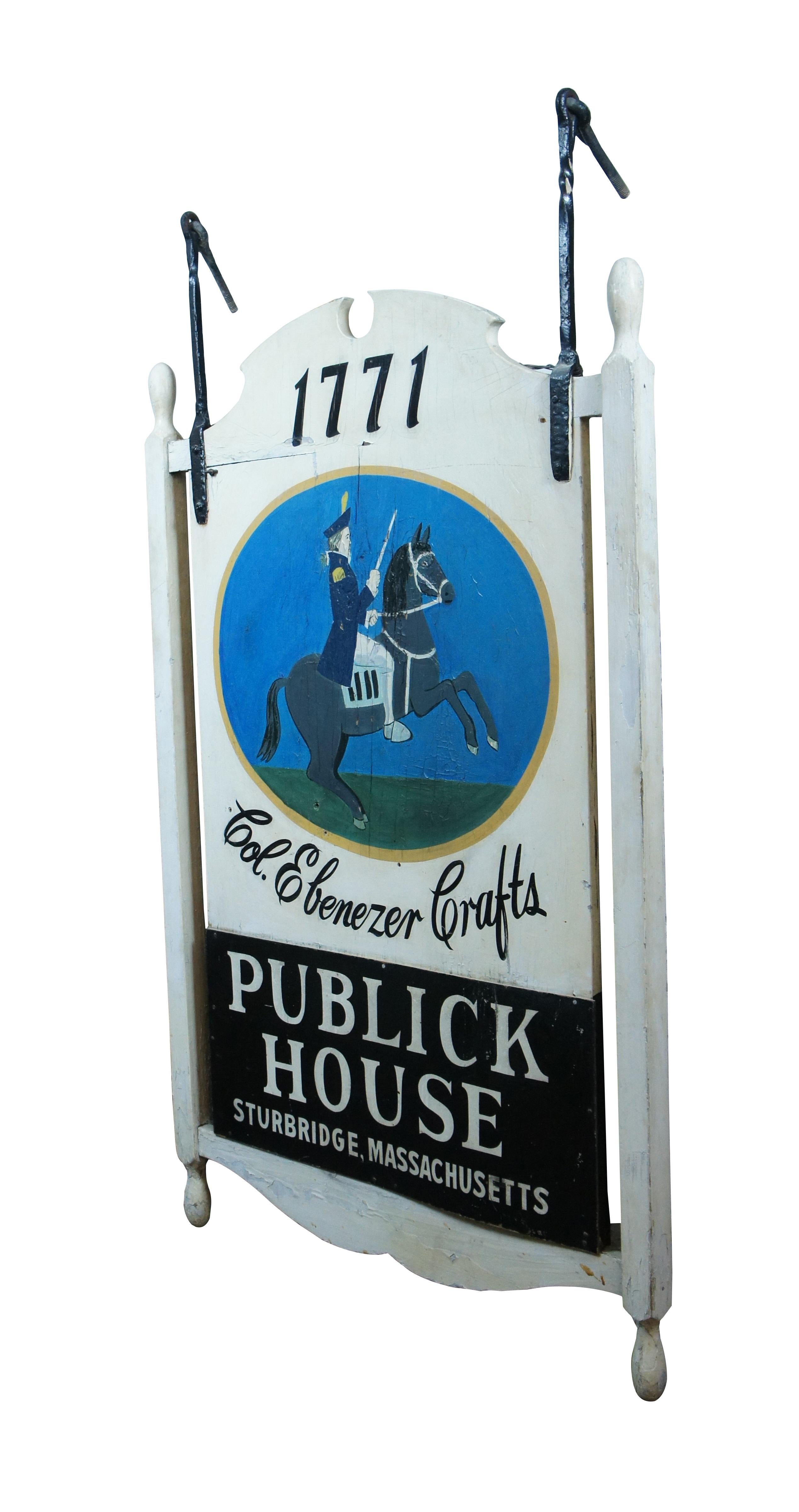 Rare antique salvaged Col. Ebenezer Crafts' Publick House of Sturbridge, Massachusetts, est. 1771 sign. Wood construction hand painted in white with black and white lettering around a blue, green and gold emblem portraying a Revolutionary soldier