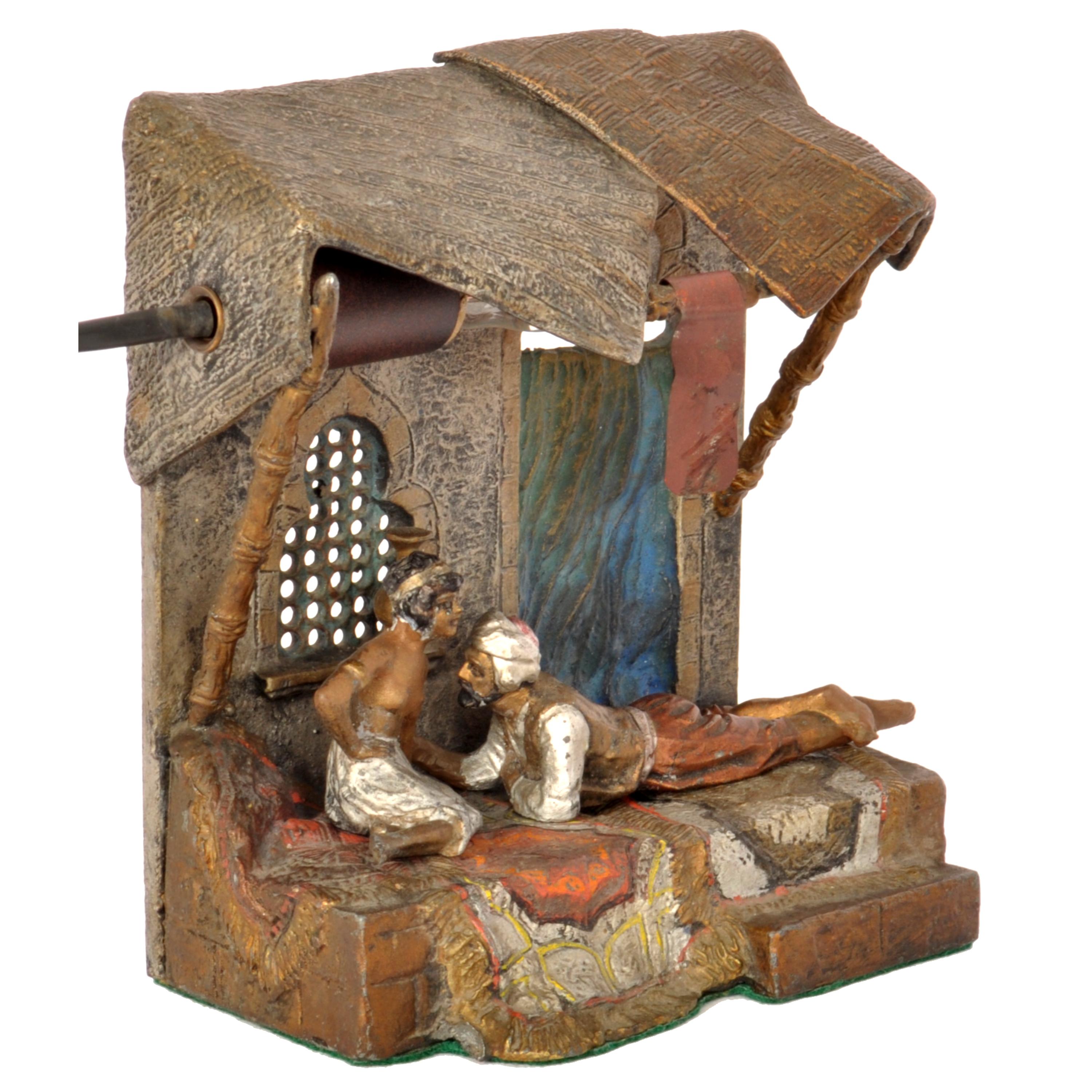A good antique Austrian Orientalist cold-painted bronze figural desk lamp, in the manner of Franz Bergmann, signed 