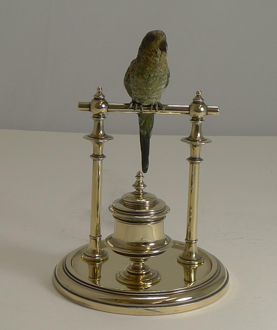 A fine late Victorian novelty inkwell featuring an Austrian cold painted bronze Budgie or Parakeet, beautifully cast and painted.

The base is made from polished brass, having been professionally polished by our silversmith.

The urn shaped