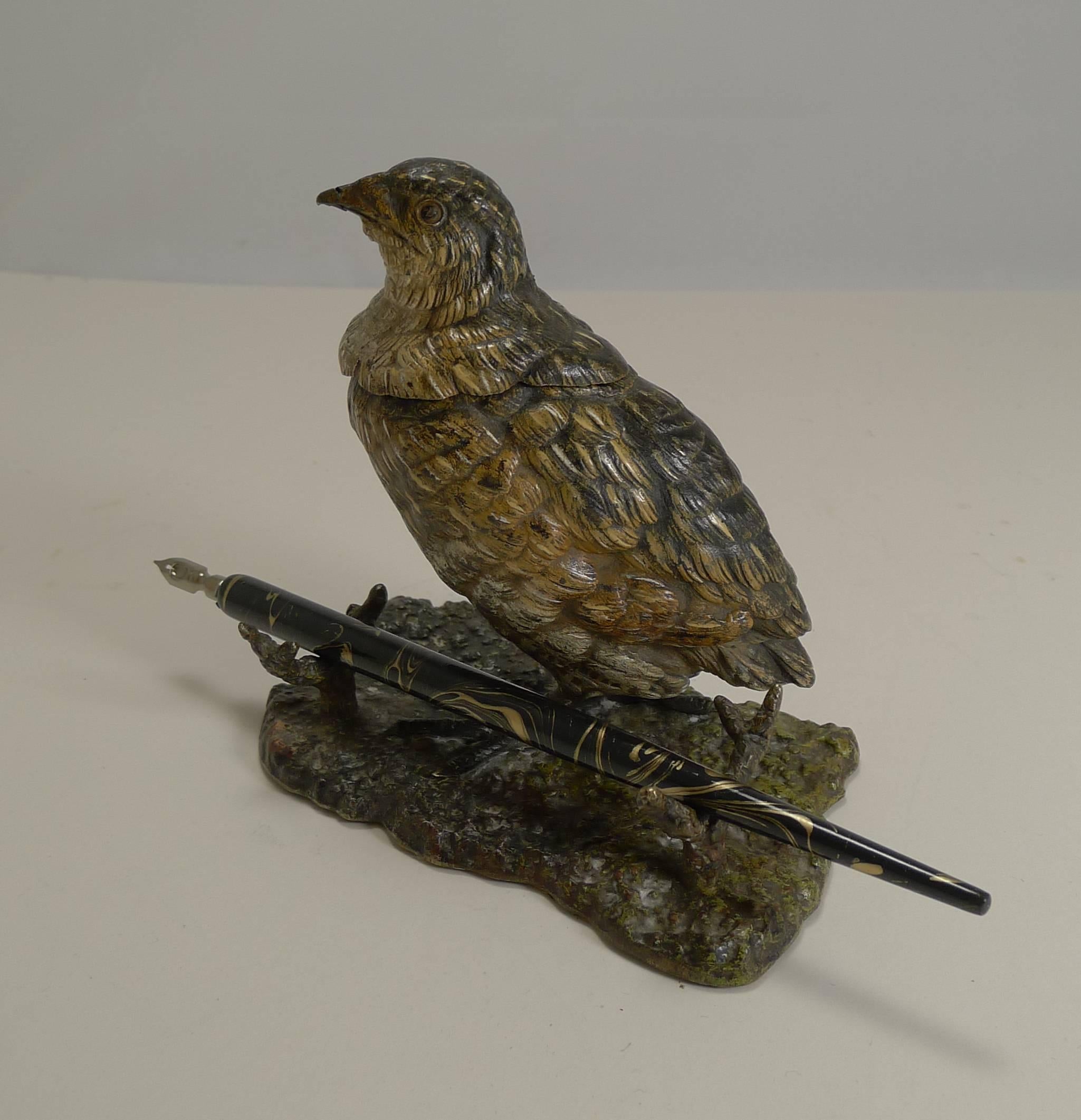 A handsome and beautifully cast Viennese bronze novelty inkwell, in the form of a Grouse, beautifully executed and cold painted.

The bird is stamped Geschutz with the maker's initials below (hard to decipher), Austrian in origin dating to around