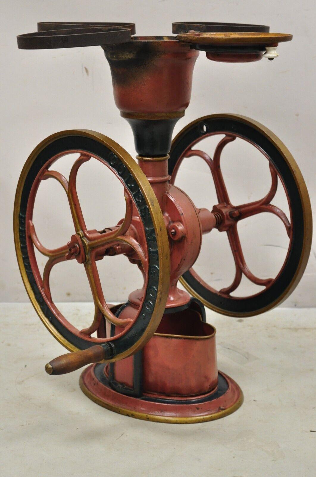 Antique Coles Mfg Co Cast Iron Red Green Victorian Large Coffee Mill Grinder. Coverted into a planter/flower pot holder. Item features a large impressive Size, original red and green painted finish (looks black in photos), cast iron construction,