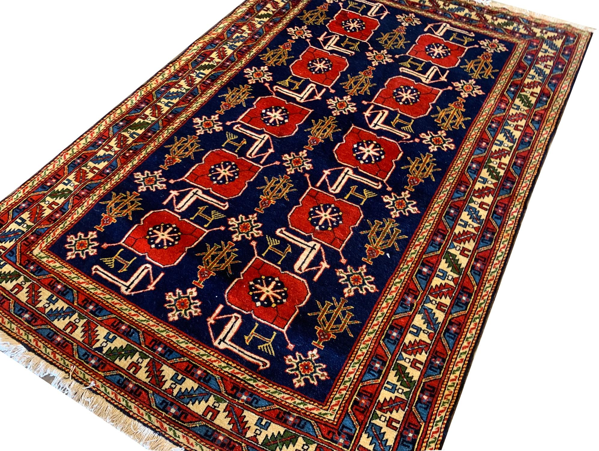 A stunning traditional Caucasian runner rug that seamlessly blends geometric design elements with captivating all over weaving. These carpets are made of all organic material including hand spun organic wool and natural vegetable dyes so they are