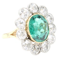 Antique Colombian Emerald (+/- 2.90 Carats) and diamonds cluster ring circa 1910