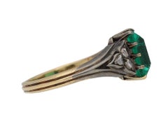 Antique Colombian Emerald and Diamond Flanked Solitaire Ring, circa 1860