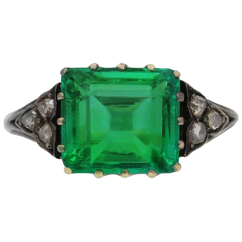 Antique Colombian Emerald and Diamond Flanked Solitaire Ring, circa 1860 For Sale