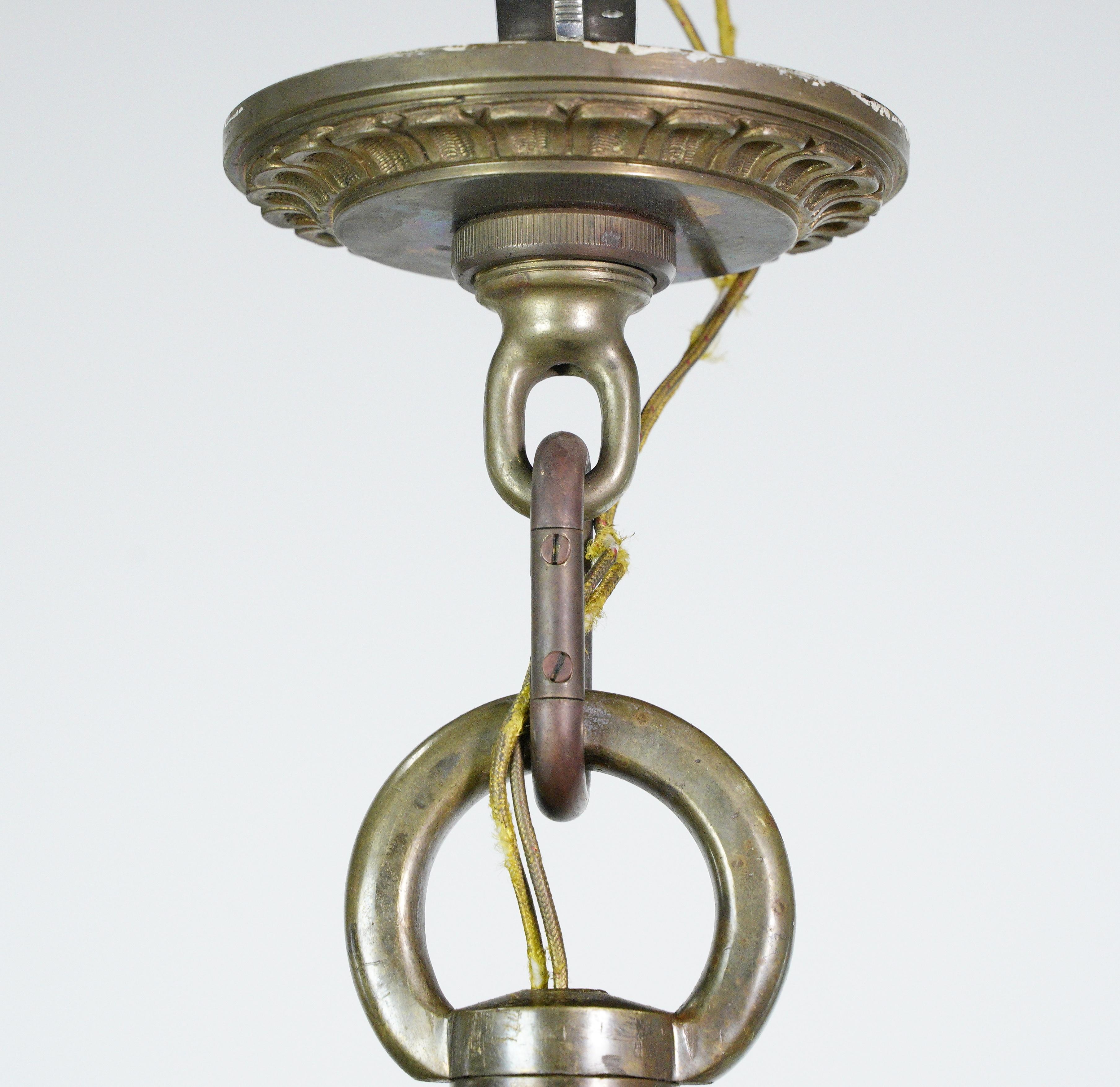 Antique Colonial 12 Arm Bronze Chandelier In Good Condition For Sale In New York, NY