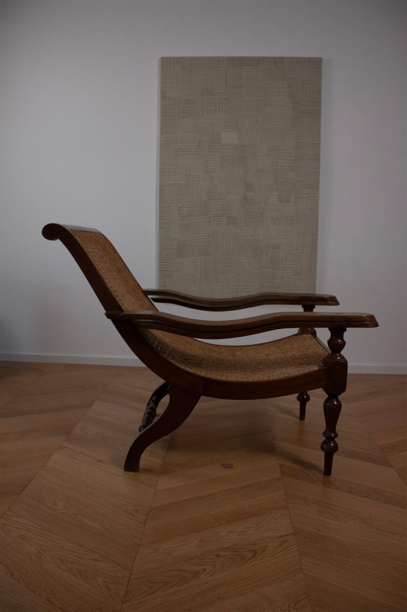 Colonial britannique Antique Coloni Plantation Woven Lounge Chair Curved Paddle Armrest (accoudoir à palette incurvée)