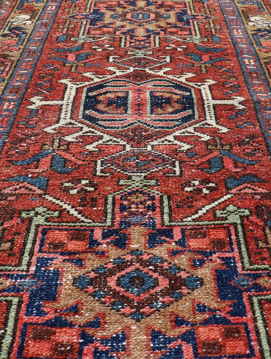 Heriz Serapi Antique Colorful Persian Heriz Rug with a Bold Geometric Design For Sale