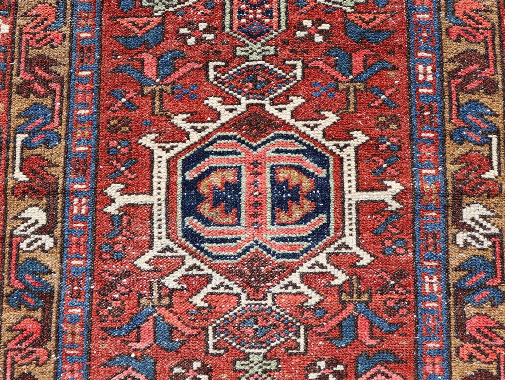 Hand-Knotted Antique Colorful Persian Heriz Rug with a Bold Geometric Design For Sale