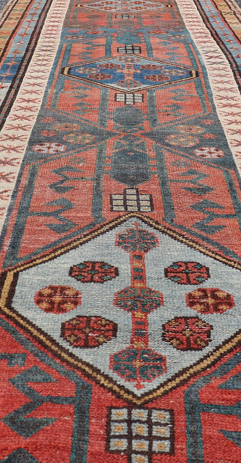 Wool Antique Colorful Persian Heriz-Serapi Runner with a Bold Geometric Design For Sale