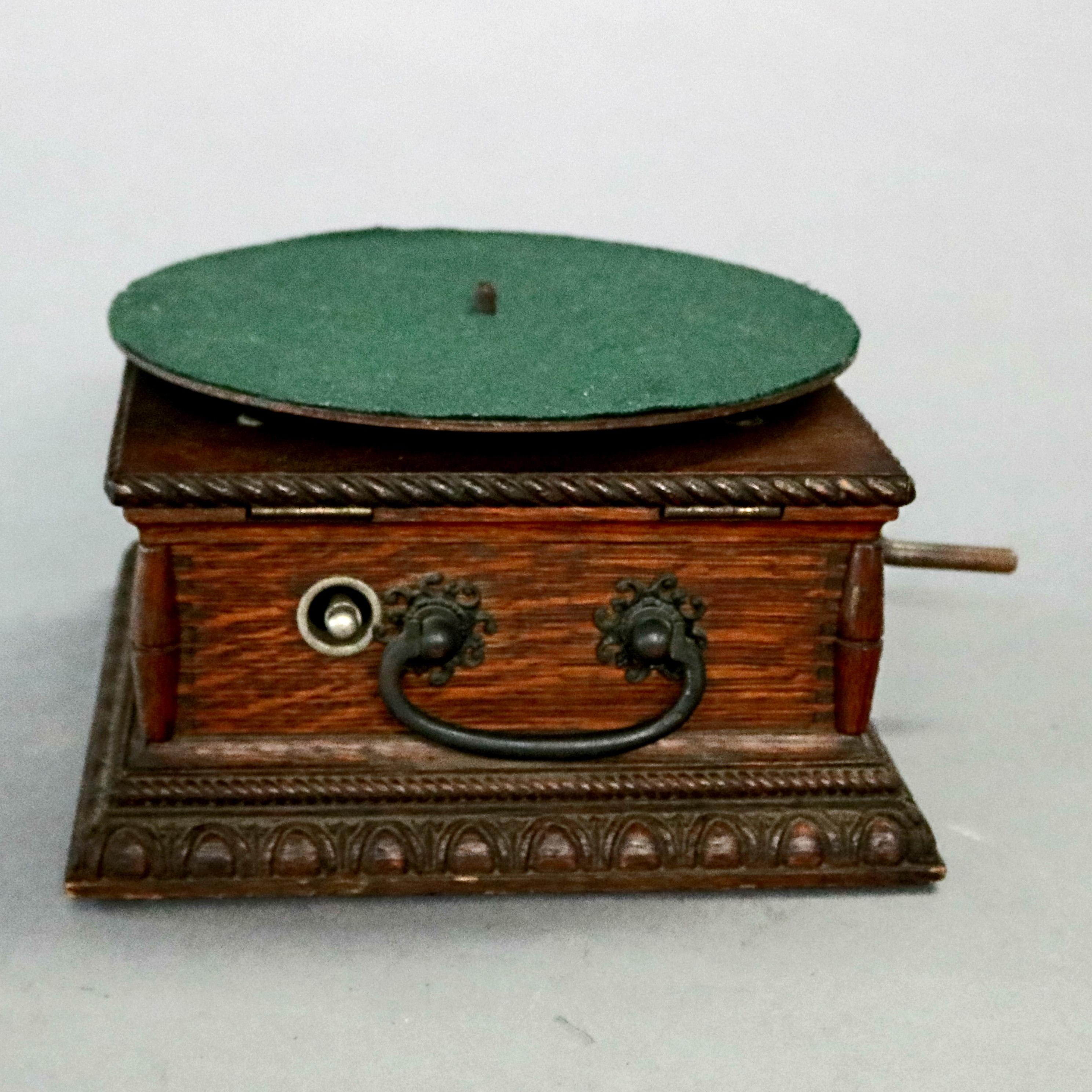 American Antique Columbia Disc Graphaphone, Carved Oak Case, circa 1900