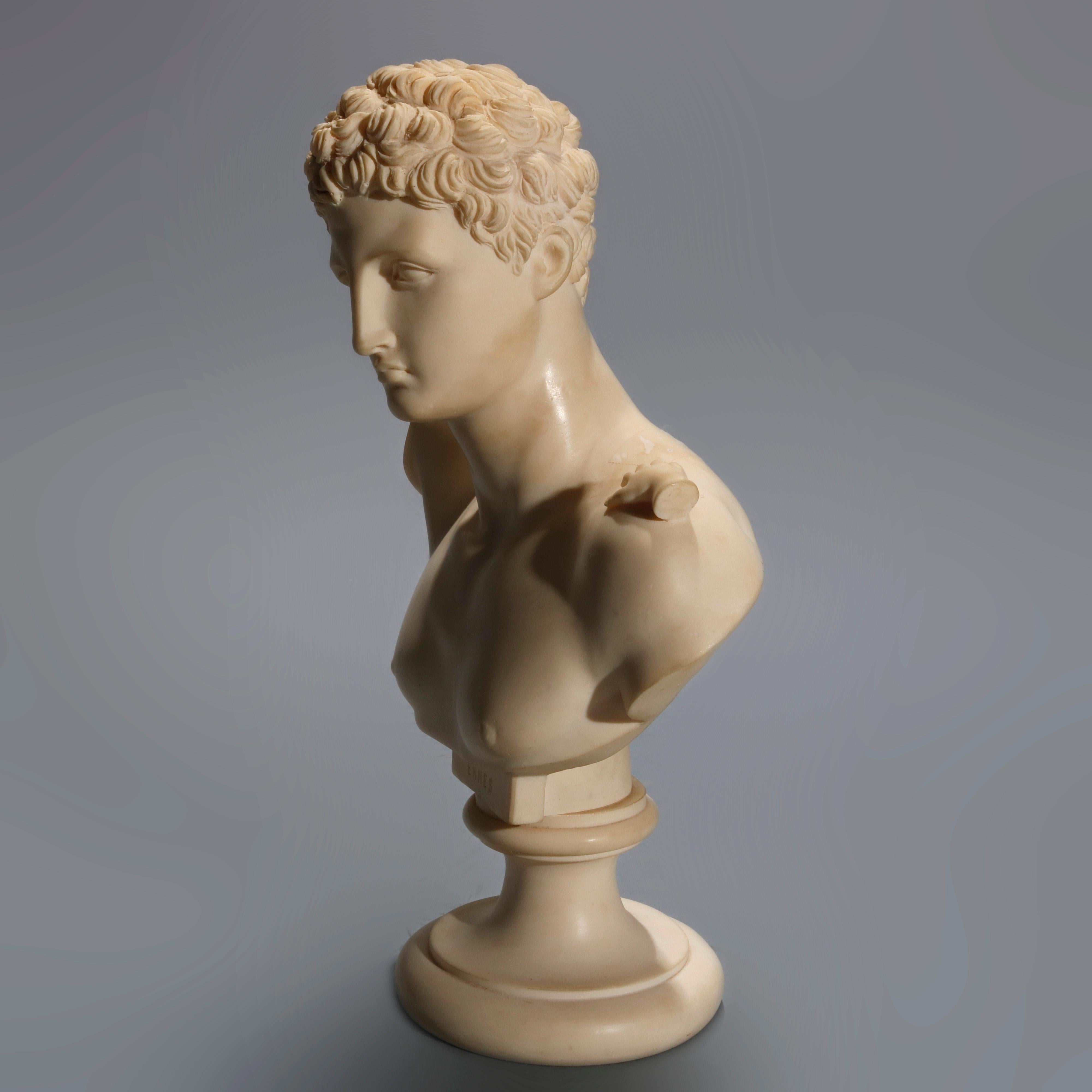 An antique molded composition portrait bust depicts David by Michelangelo on stepped plinth, signed G. Ruggeri Ermes, 20th century.

Measures: 12.63