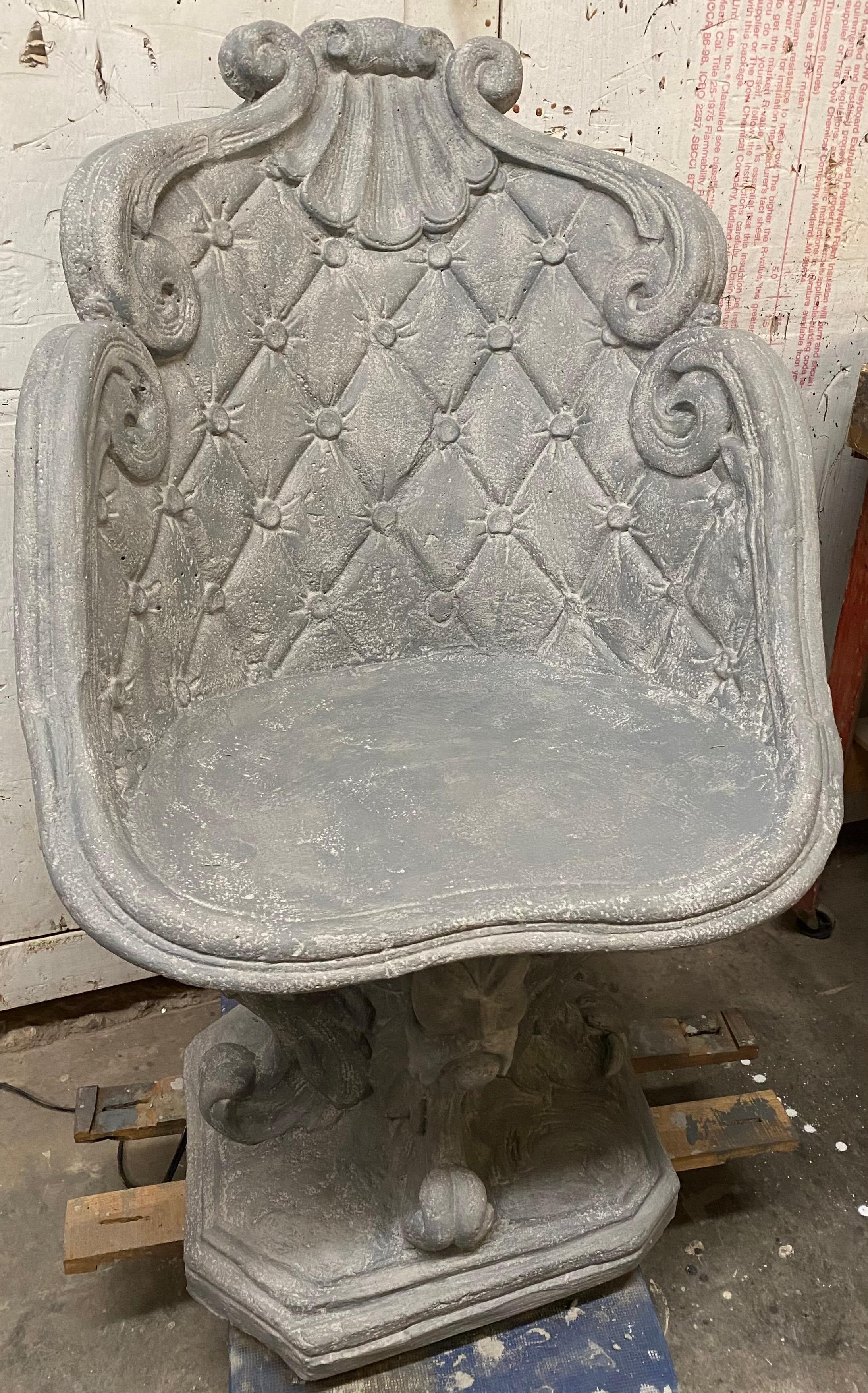 The wonderfully unique garden throne chair is decorated with center shell, diamond quilted design raised on a pedestal of 4 heads of mythological figure of Egyptian god Ammon-Ra depicted with ram horns. Rams were considered a symbol of virility due