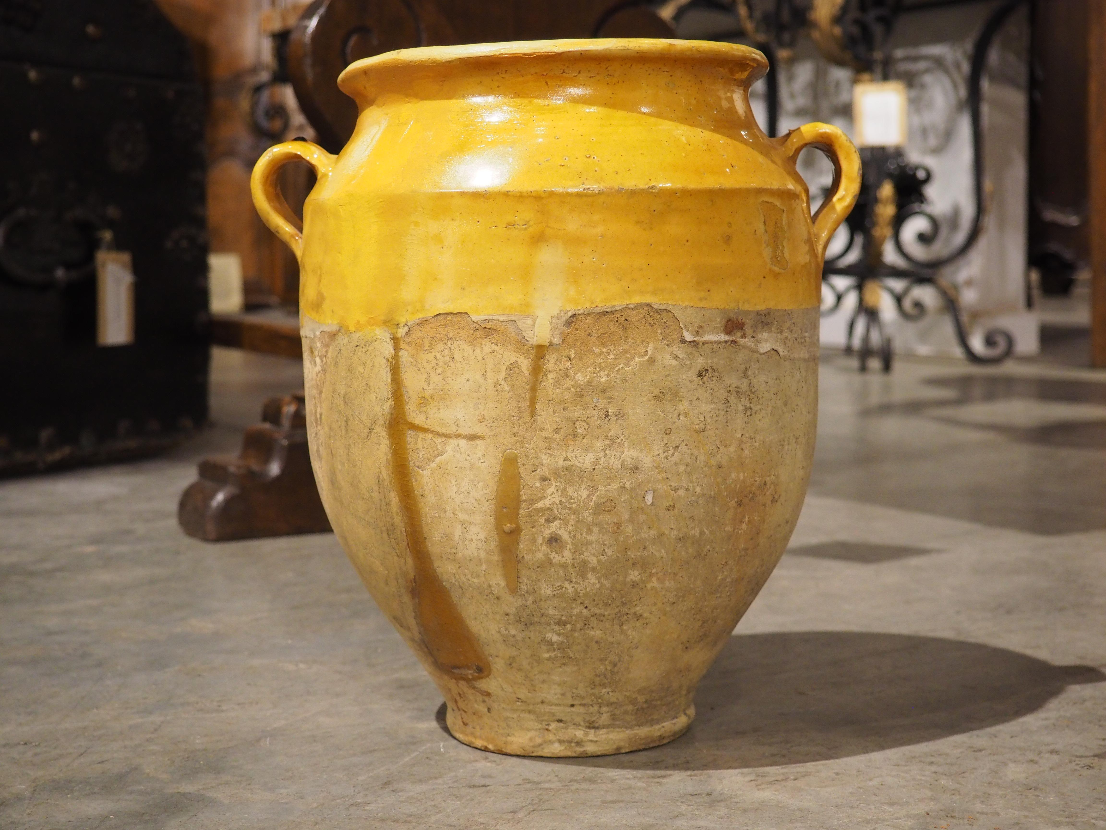 Part of our huge collection of large, colorful clay vessels, known as confit pots. Derived from the French word confire (meaning “to preserve”), confit pots were used to store cooked game in their own fat before the advent of refrigeration. The