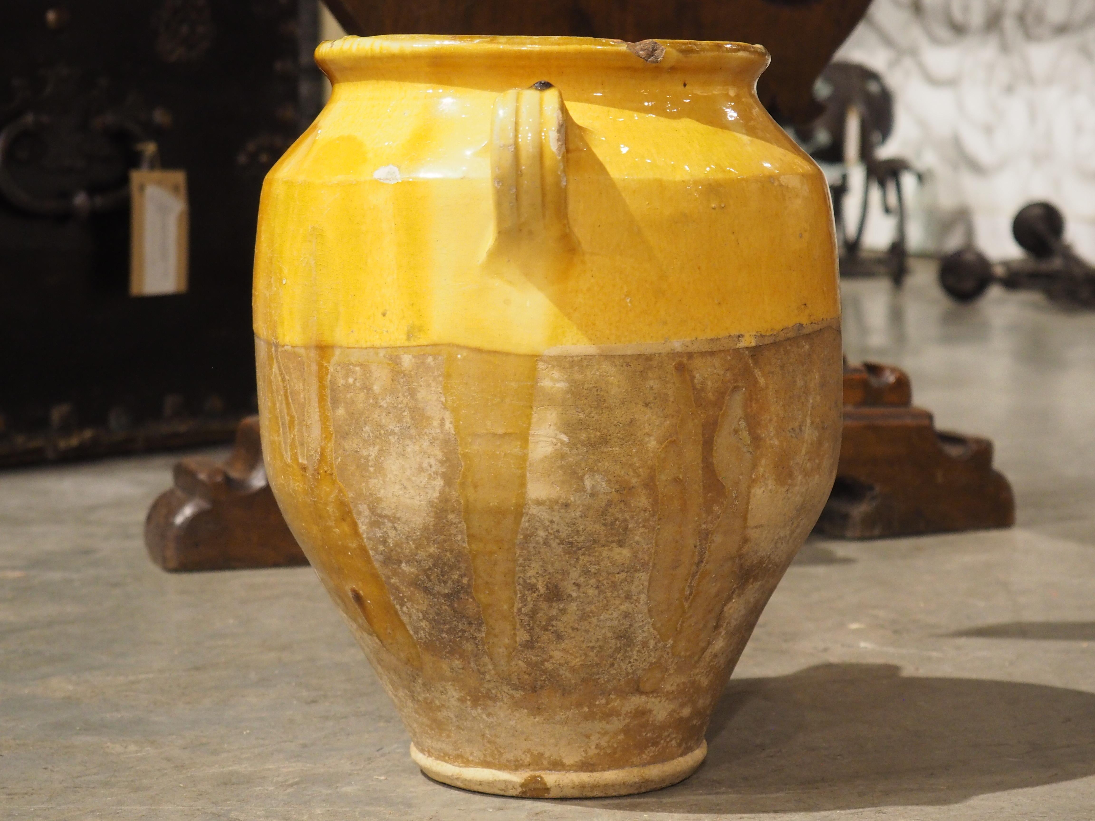 Part of our huge collection of large, colorful clay vessels, known as confit pots. Derived from the French word confire (meaning “to preserve”), confit pots were used to store cooked game in their own fat before the advent of refrigeration. The