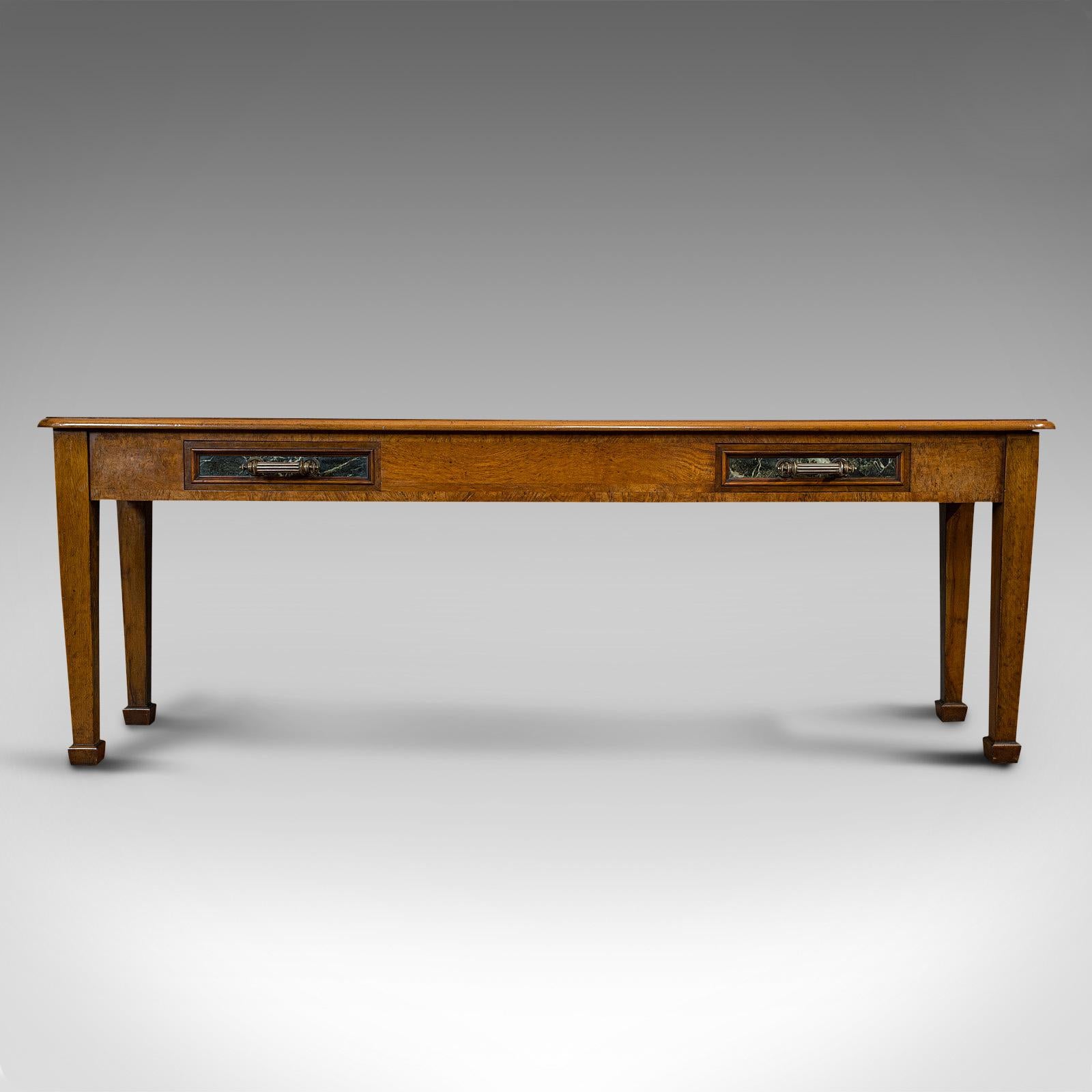 This is an antique console table. A large, Scottish walnut and oak desk or hall table by J & T Scott of Edinburgh, dating to the Victorian period, circa 1880.

Exquisite Scottish furniture
Displays a desirable aged patina
Walnut tabletop offers
