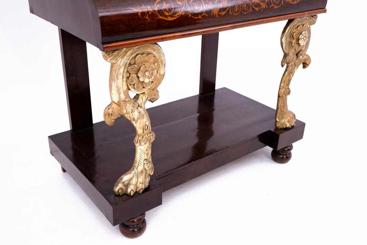 An antique console with a mirror from the first half of the 19th century.
Beautiful intarsia and animal and floral motifs 
Dimensions: height 214 cm / width 110 cm / depth 60 cm