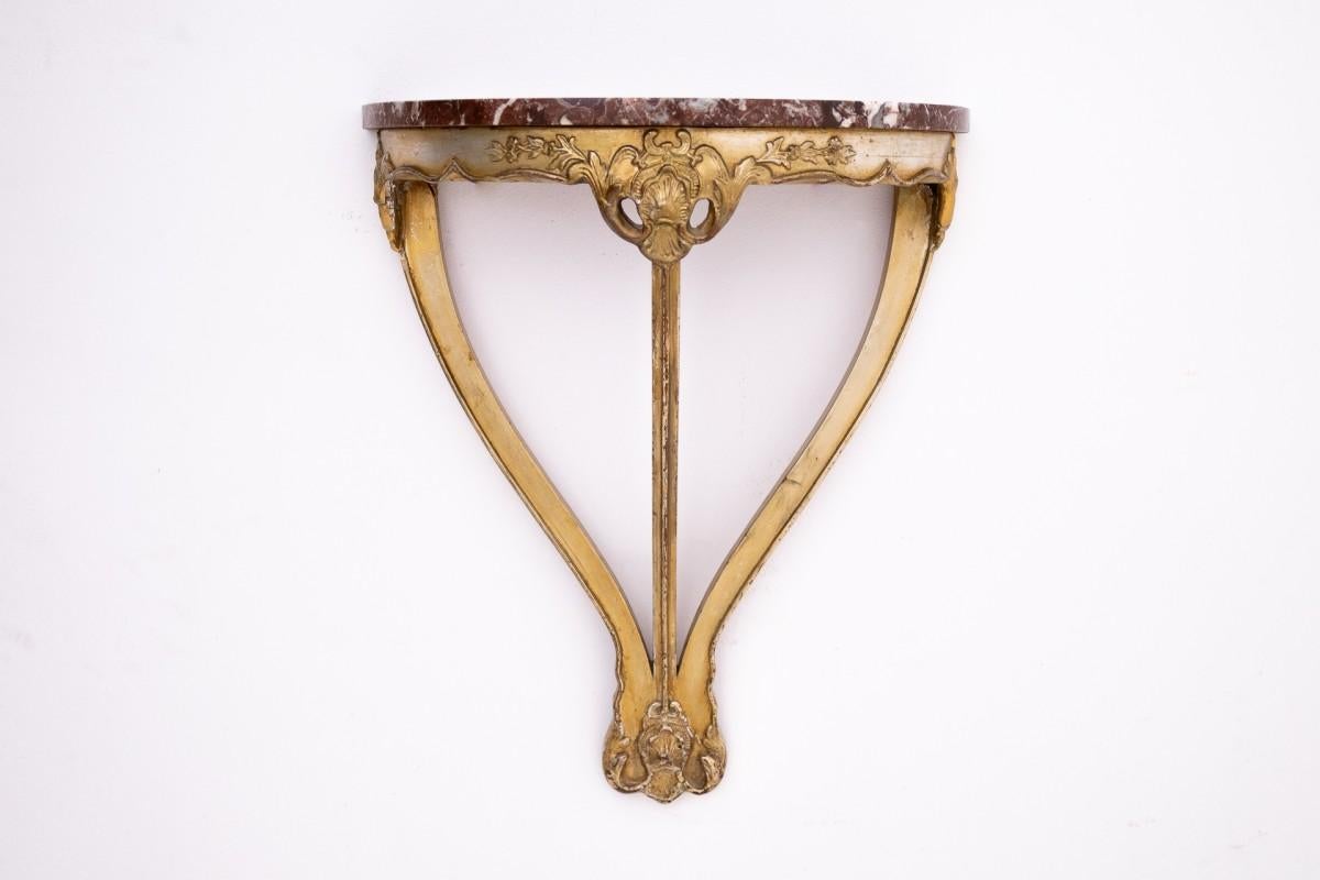Console avec plateau en pierre, vers 1890, France.

Dimensions : hauteur 67 cm / largeur 55 cm / profondeur 24 cm
