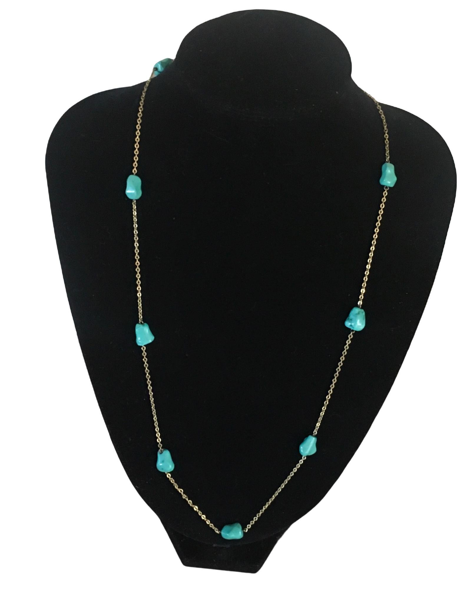 An antique continental 8 carat gold and turquoise necklace.
Stamped 333 to the clasp
333 gold is mainly made in Germany.

9 Turquoise rough polished beads alternately set between oval gold linked chain.
Approx length 66 cm
Weight 12 grams 
In very