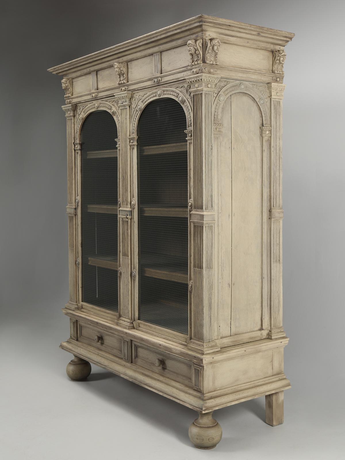 This incredibly imposing antique cabinet is not the norm for us to offer here at Old Plank, however, there was just something about the scale and the oversize proportions that drew our attention. The more we looked at the antique armoire or