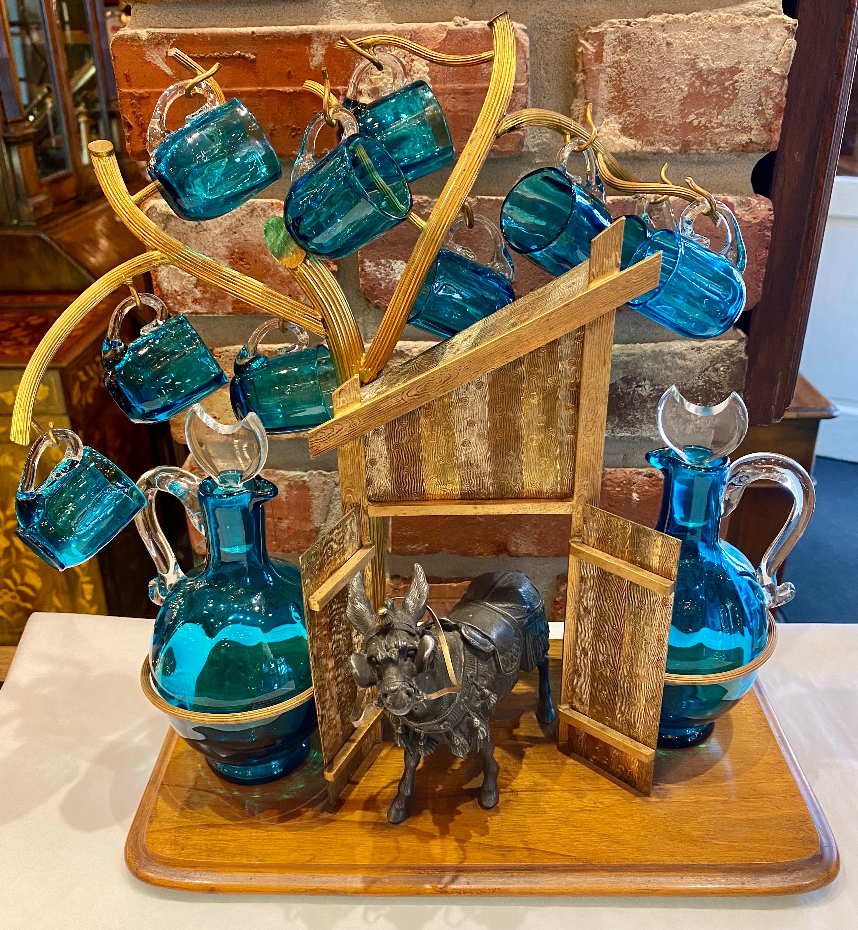 Antique continental bronze D'Ore and blue crystal glass figural cordial/liqueur set, circa 1890.