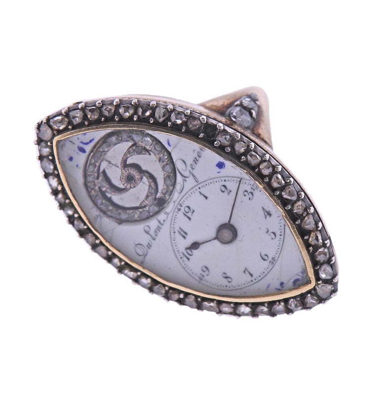 Antique, circa 1850s, Continental 18k gold and silver ring with watch, surrounded with rose cut diamonds. Ring size - 6, ring top - 33mm x 20mm. Hallmarked with Continental marks on the outside of the shank, engraving on the back of the case -