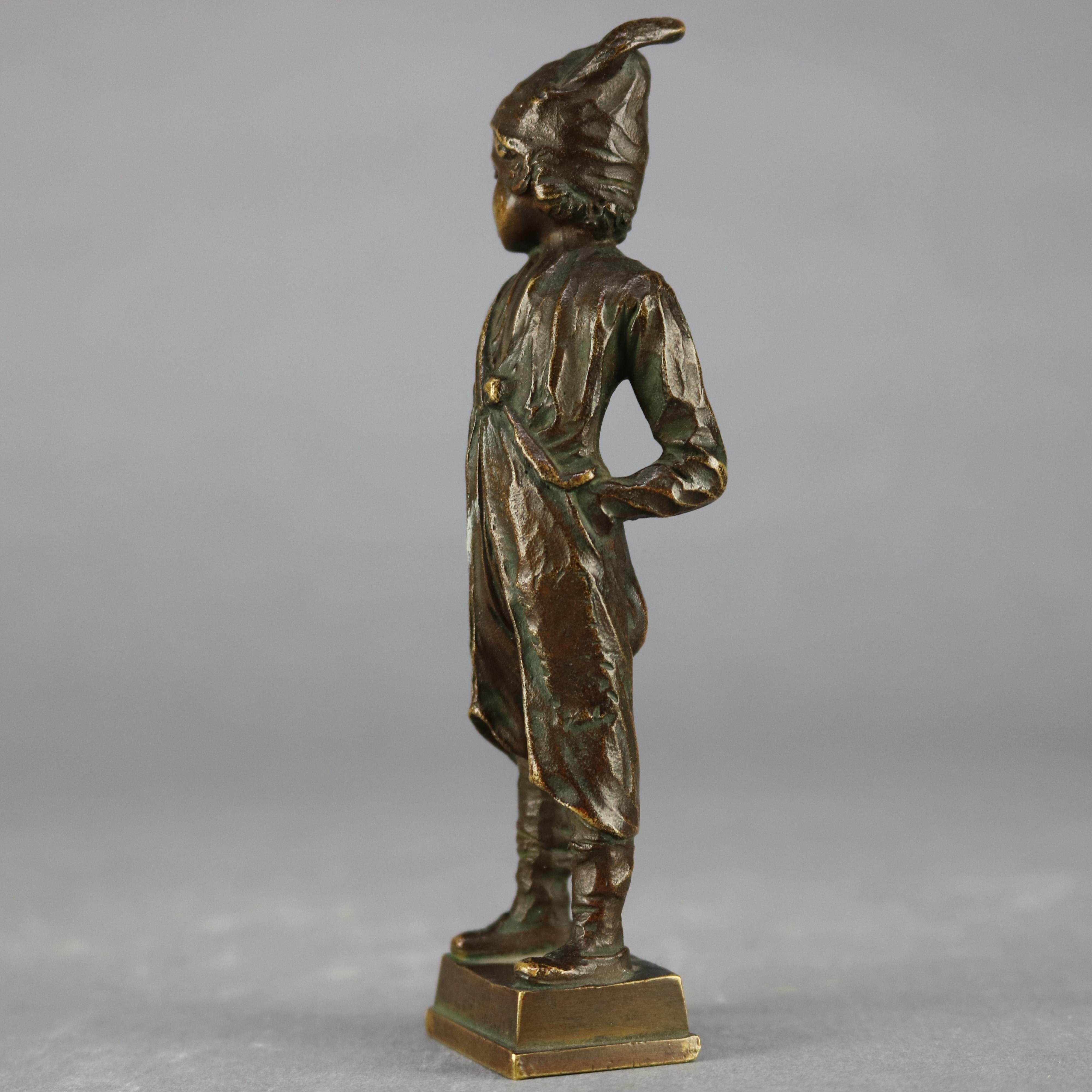 An antique Continental figural cabinet sculpture offers cast bronze construction and depicts young boy, signed Beck on plinth as photographed, circa 1900.

Measures: 5
