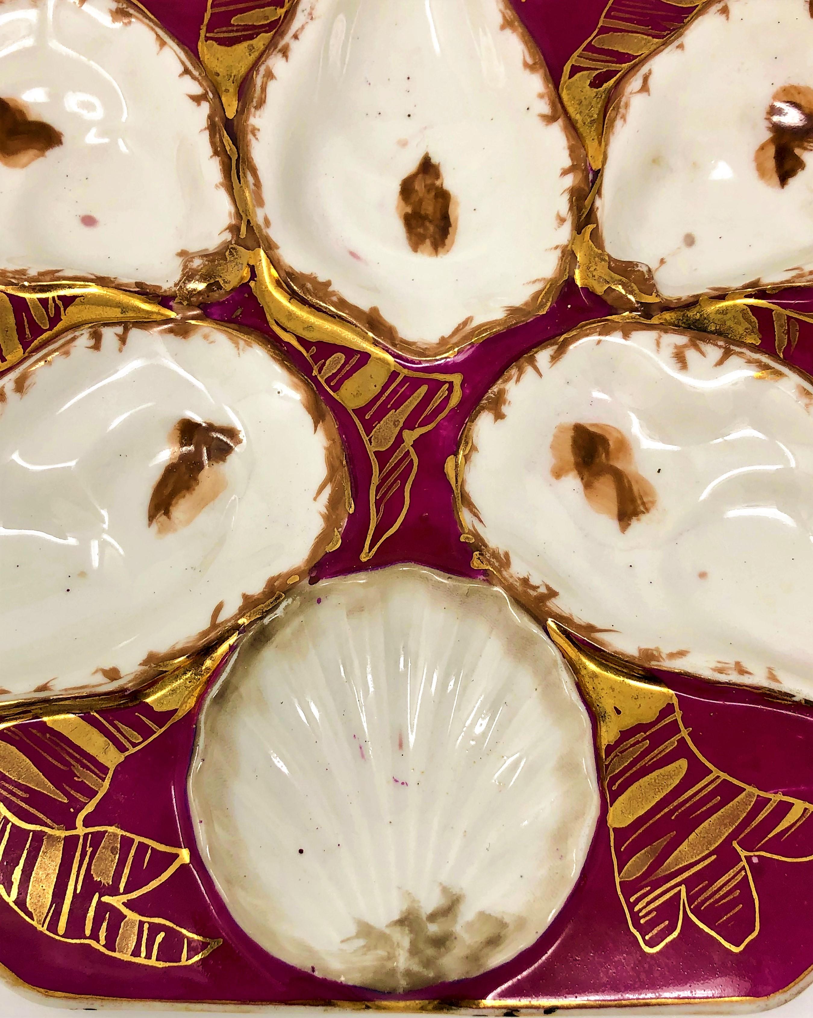 Antique Continental hand painted porcelain oyster plate, circa 1880-1890.