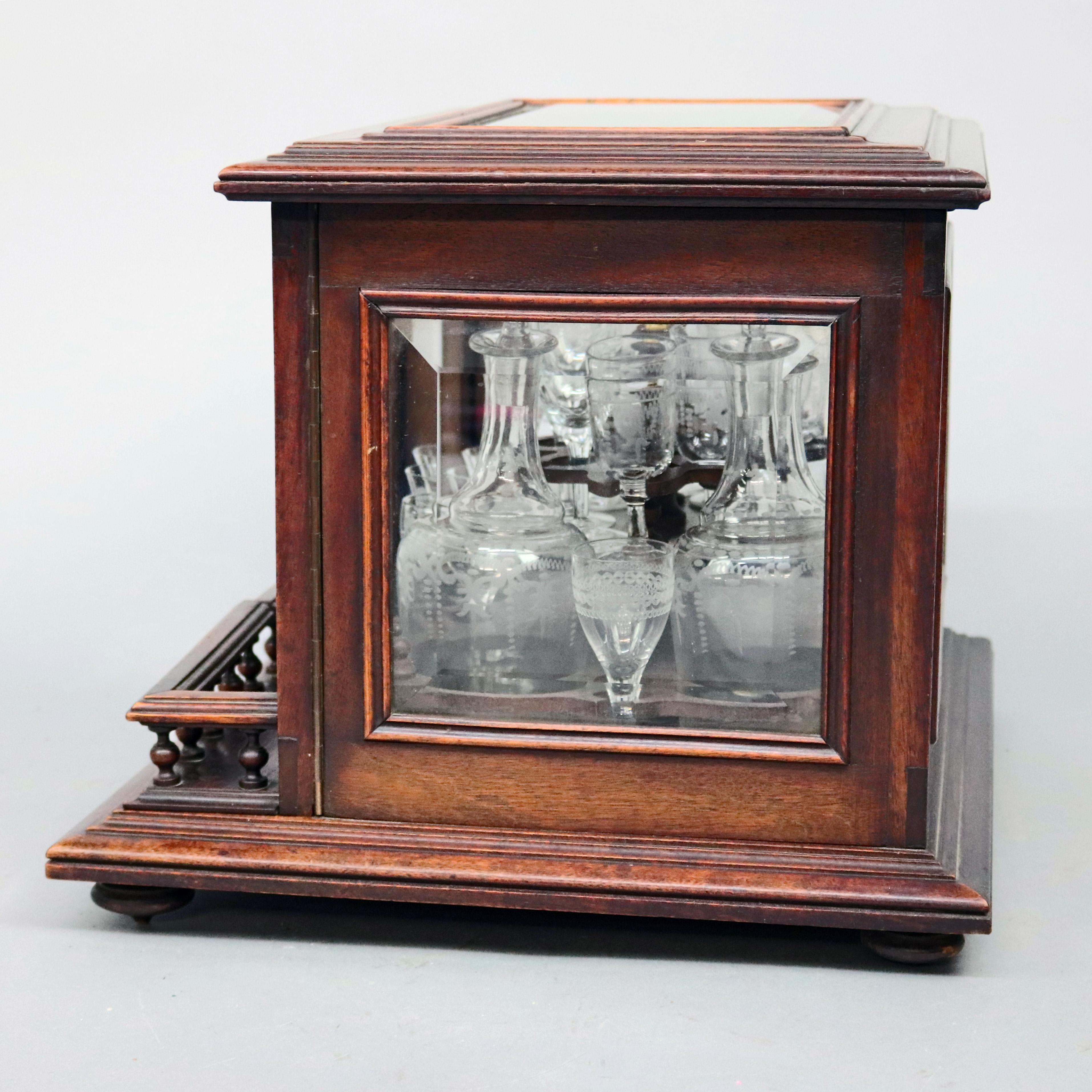 European Continental Mahogany and Etched Glass Tantalus Set with Stemware, circa 1890