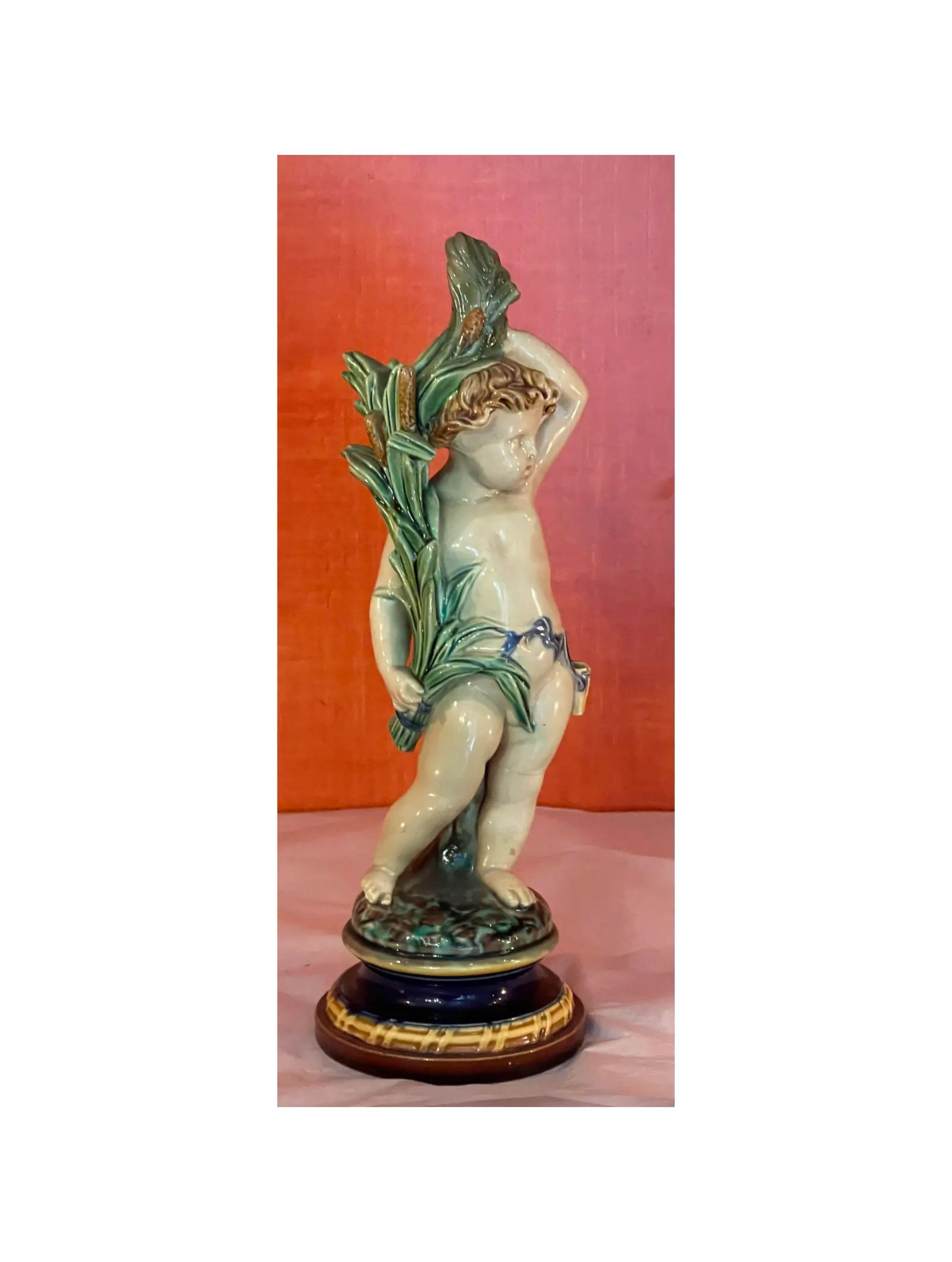 French Provincial Antique Continental Majolica Pottery Putti Figure, 19th Century