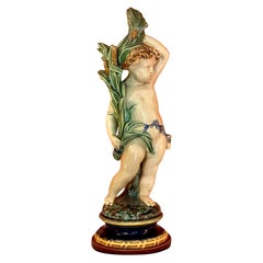 Antique Continental Majolica Pottery Putti Figure, 19th Century