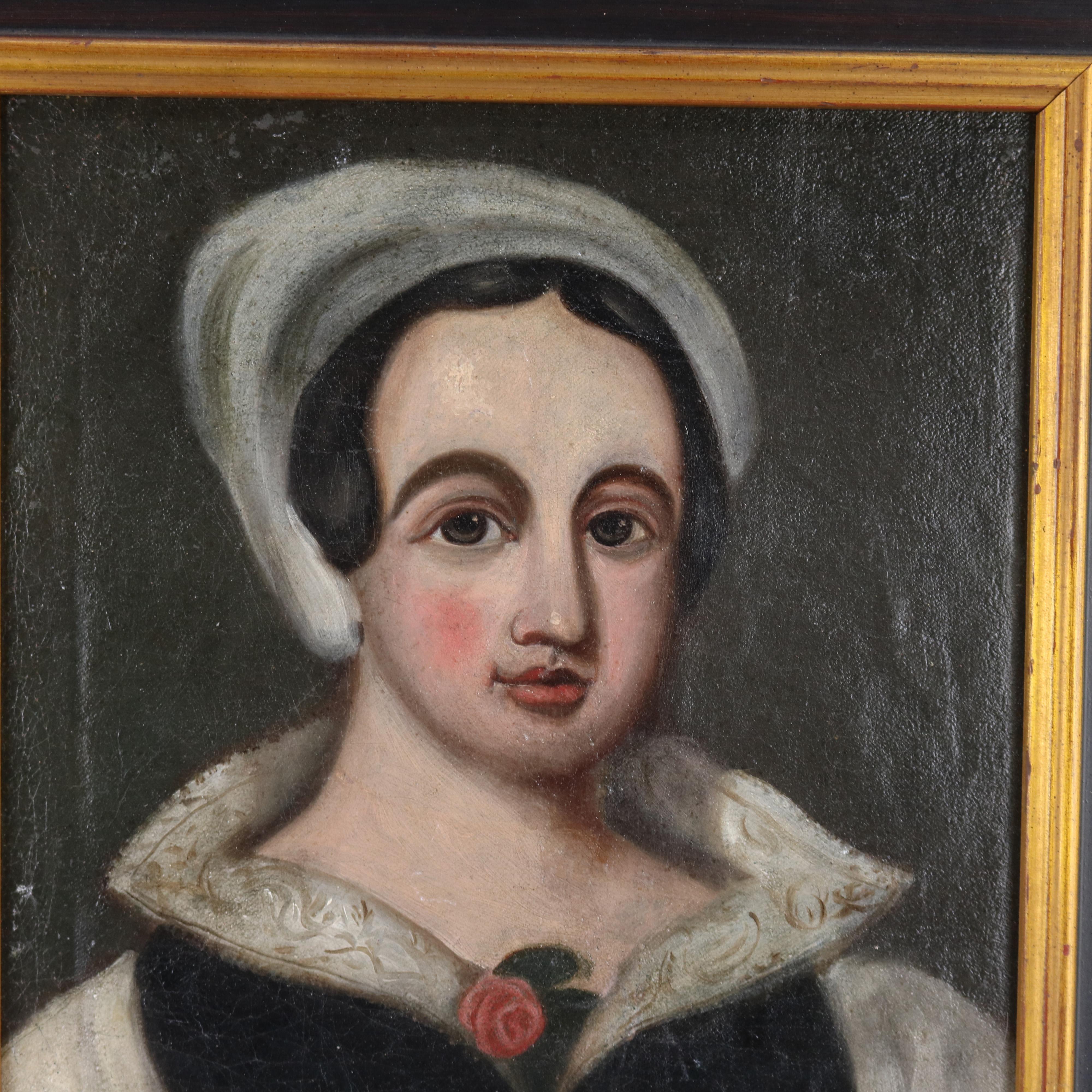An antique Continental portrait painting is oil on canvas laid on board and depicts young woman, unsigned and giltwood framed, 19th century

Measures: 18