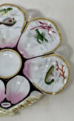 Antiguo plato de ostras de porcelana continental en forma de abanico con vida marina circa 1890