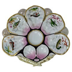 Antiguo plato de ostras de porcelana continental en forma de abanico con vida marina circa 1890