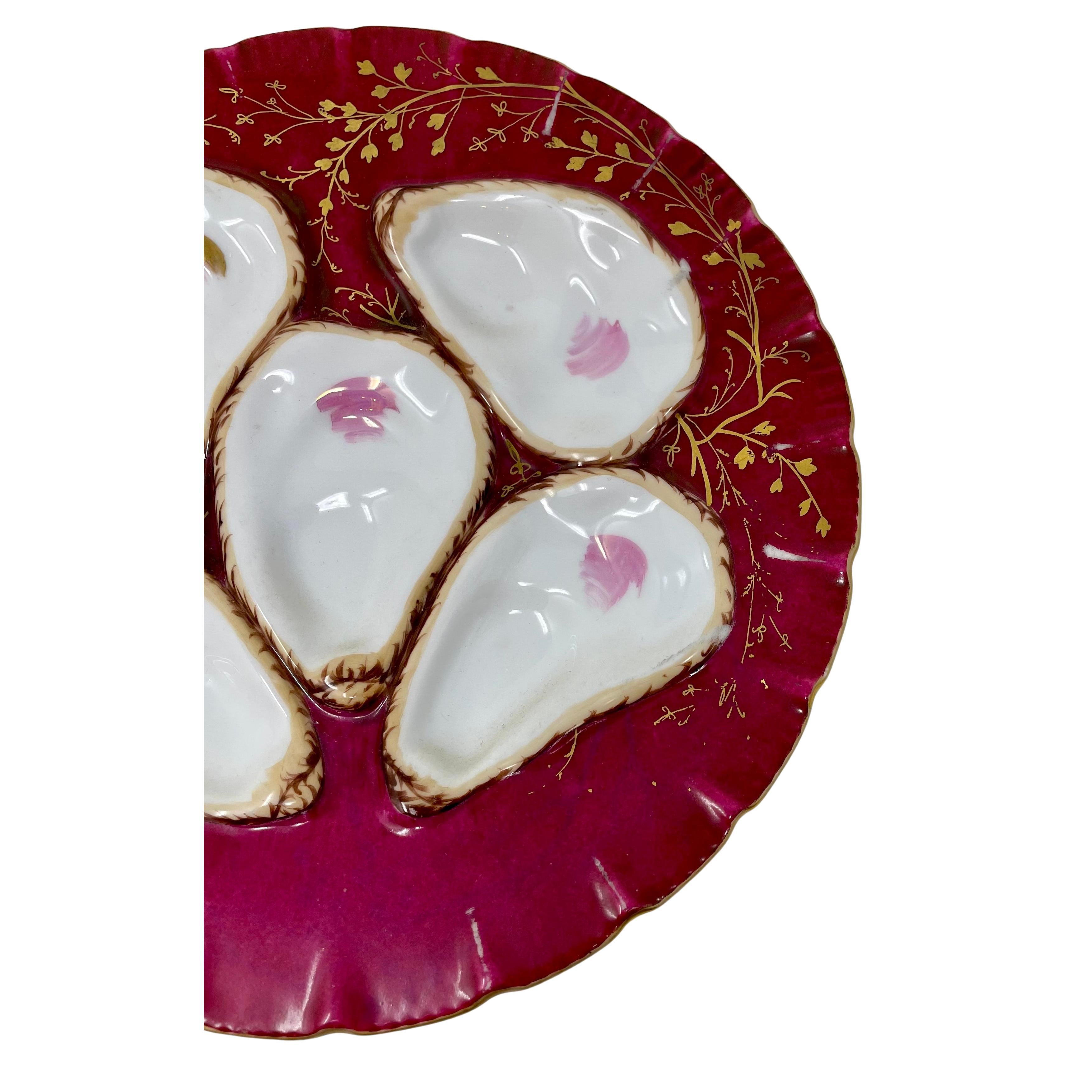 Antique continental porcelain raspberry red & gold oyster plate, circa 1880's.