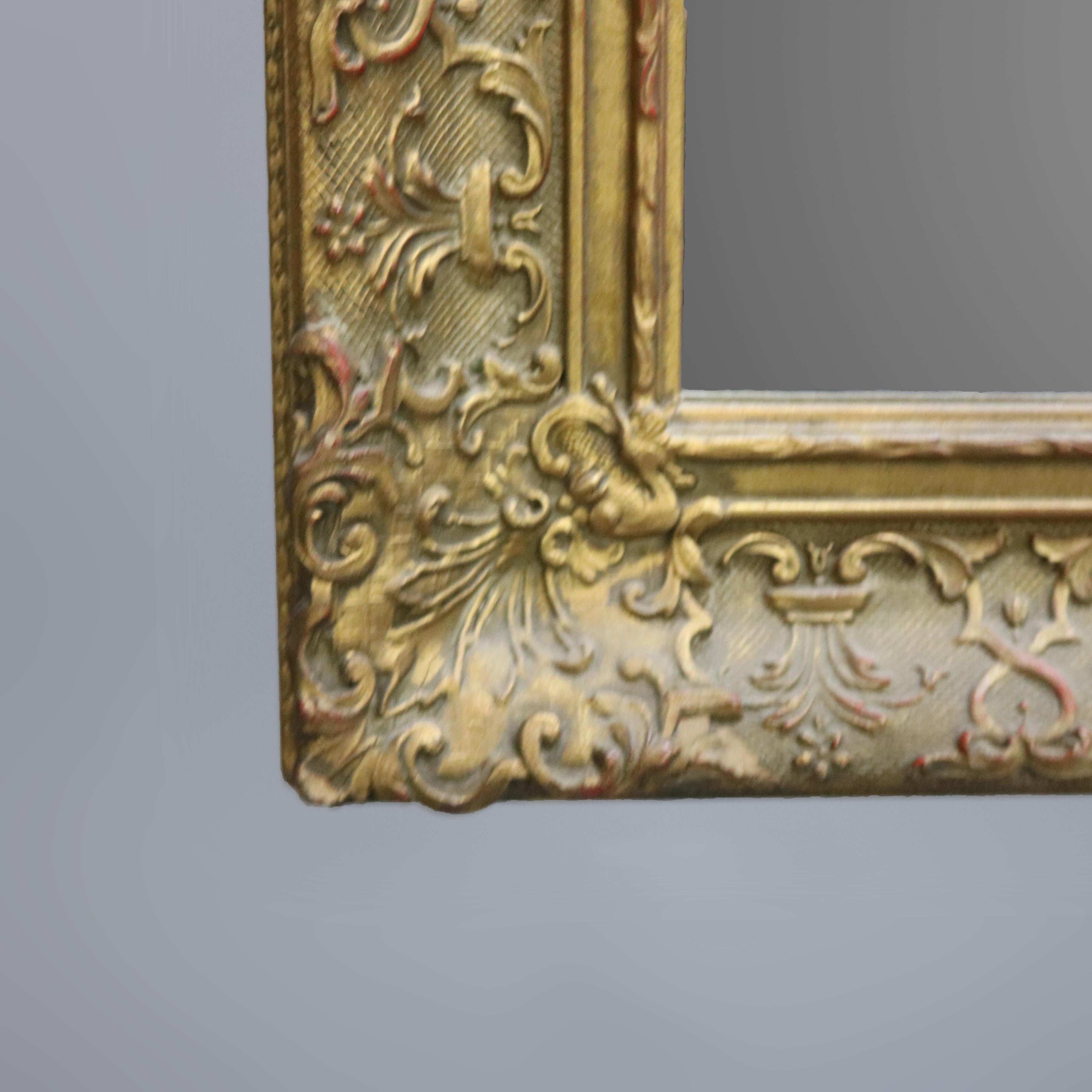 Antique Continental Scroll and Foliate Giltwood Framed Wall Mirror, circa 1900 In Good Condition For Sale In Big Flats, NY