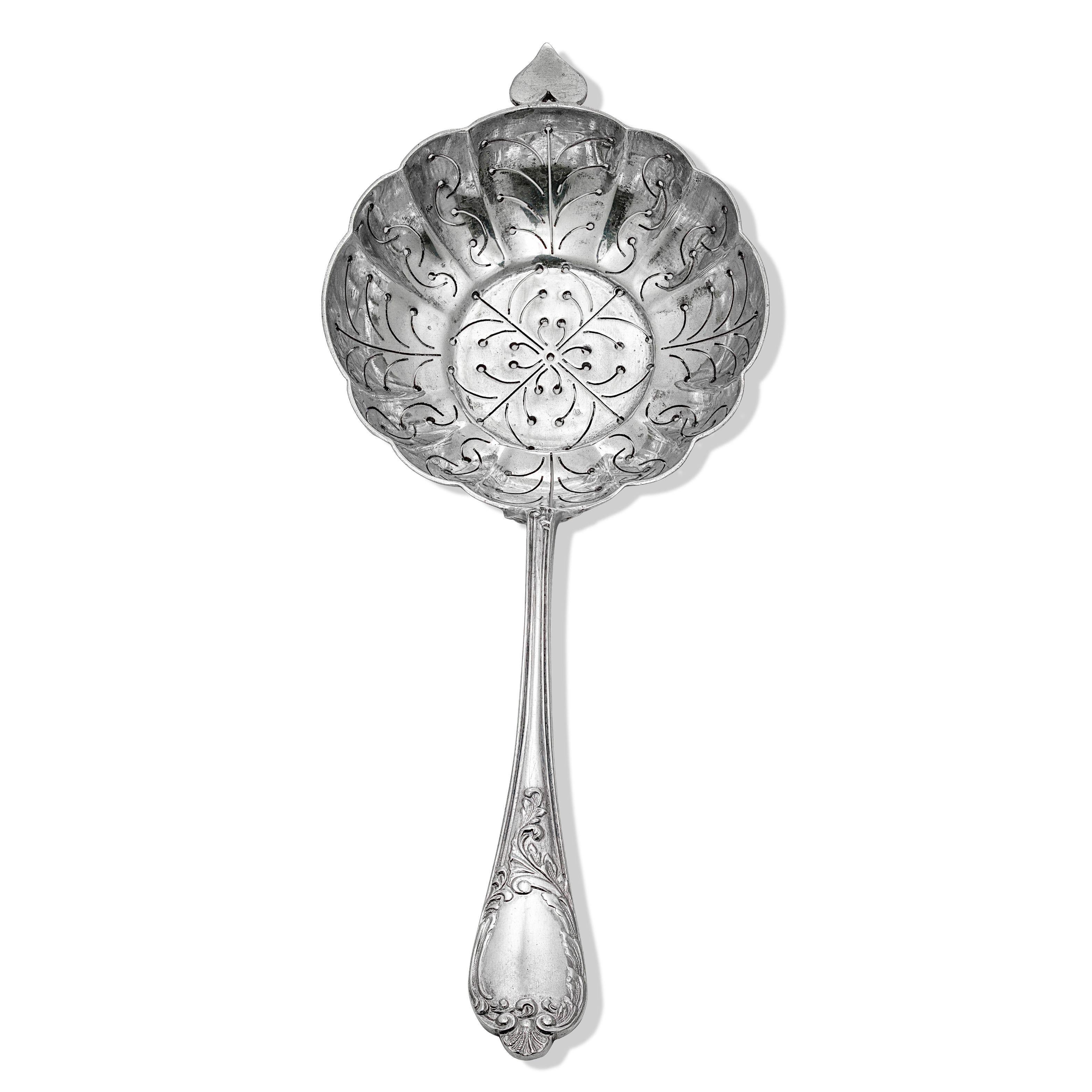 Fine quality Austrian continental silver sugar sifter/berry spoon, distinctive scalloped and beautifully pierced Gilt bowl. Decorative handle. Fine quality made from heavy gauge Continental Silver, weighing approx. 85.78g. Measuring approx. 7.25”